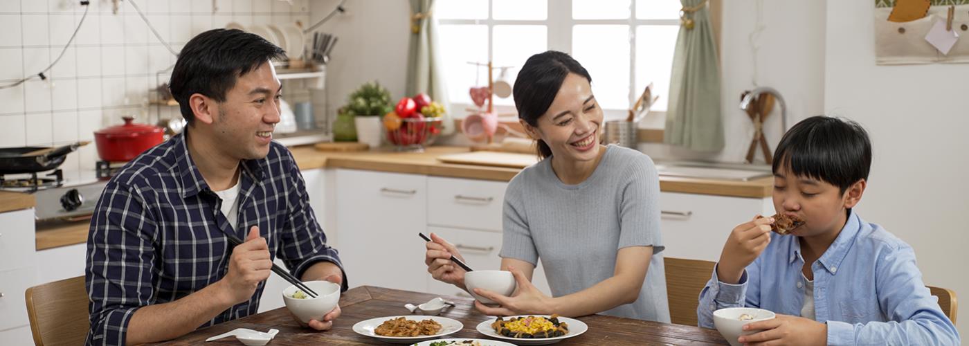 parents watching kids eating